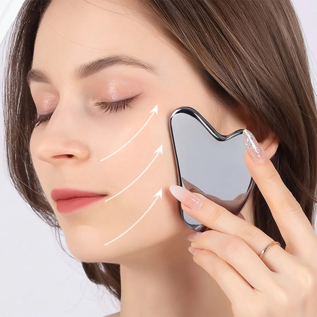Gua sha de acero inoxidable para masaje facial