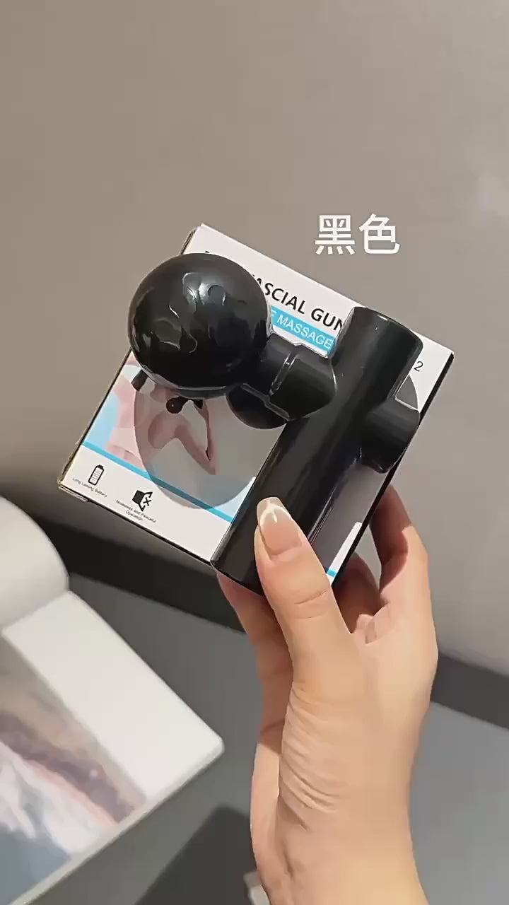 Mini Pistola de Masaje Portátil en uso